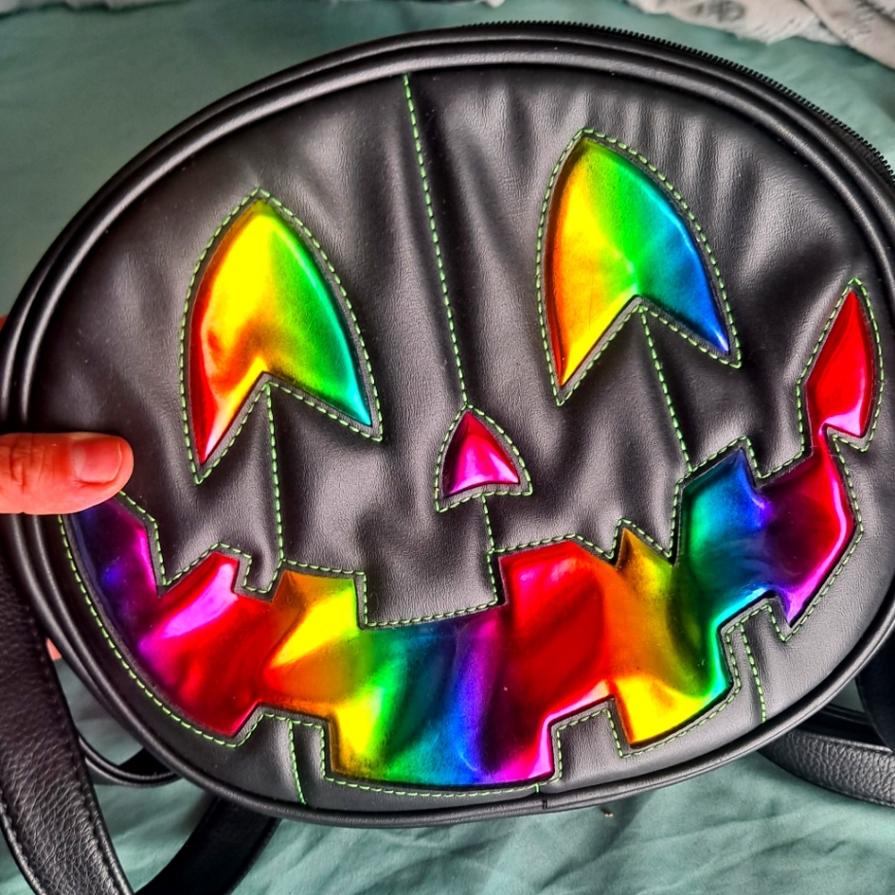 Love Pain Stitches holographic pumpkin purse